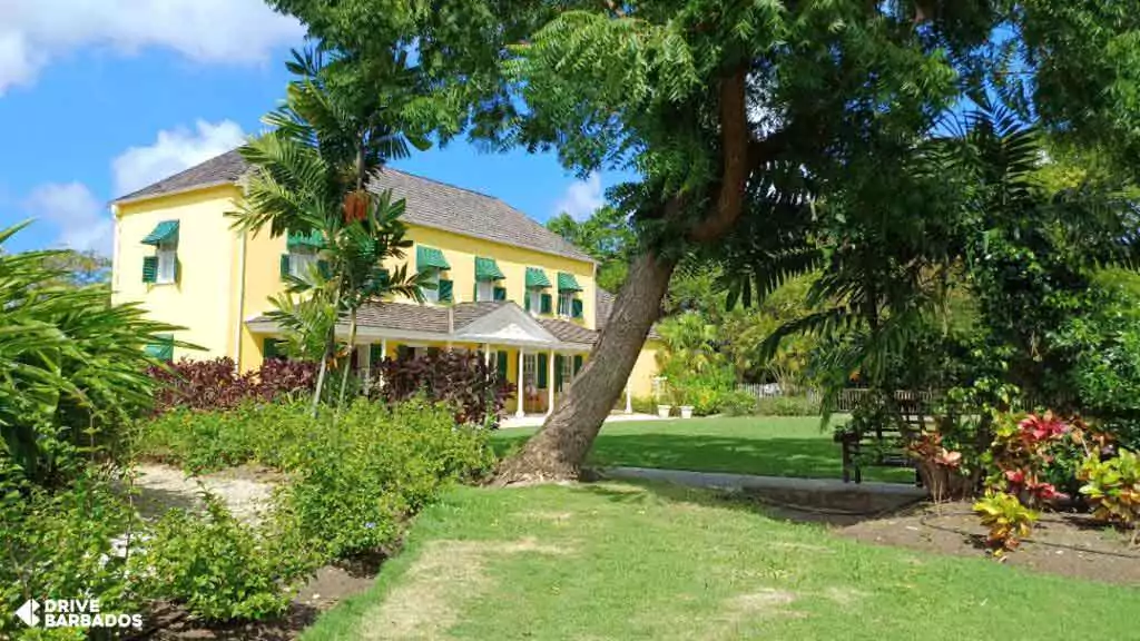 George Washington House surrounded by lush gardens under the bright Barbadian sun, The Garrison, Bridgetown, Barbados