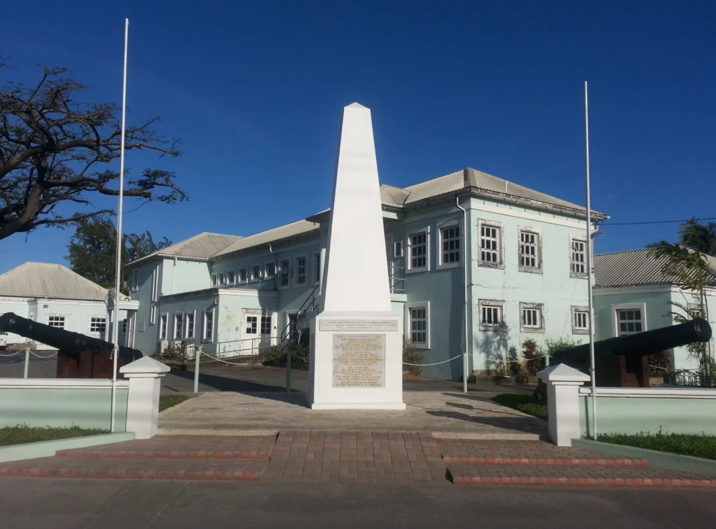 The Holetown Monument St. James Barbados The Holetown Monument in Saint James Barbados with colonial architecture and historical cannons