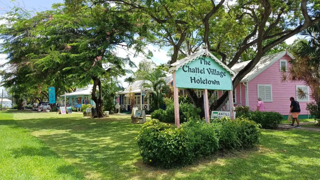 The Chattel Village Shopping – Holetown The Chattel Village in Holetown with colorful wooden shops reflecting traditional Barbadian architecture.