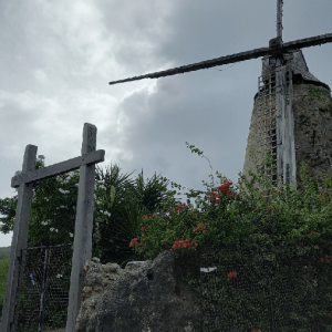 Historic Morgan Lewis Windmill against cloudy sky in Cherry Tree Hill, Barbados